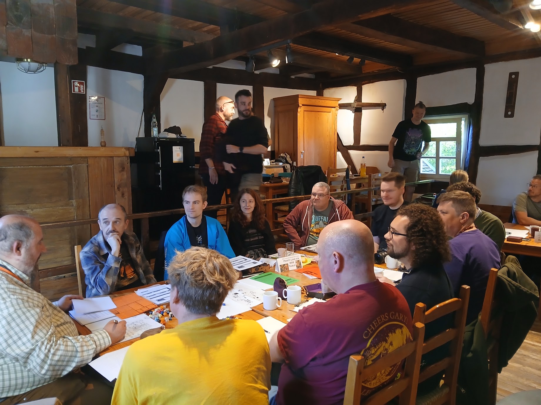 The table behind just got massacred in Blackmoor, the table in front is about to get killed by Melan.